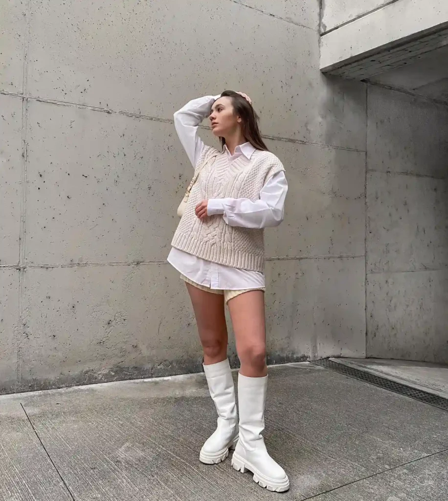 Knit Vest and Oversized Shirt with White Knee-High Boots
