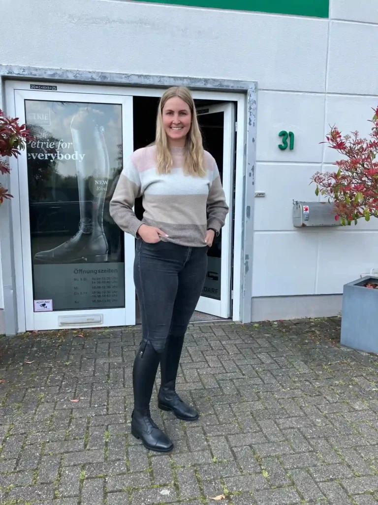 Color-Block Sweater and Grey Jeans with Tall Riding Boots