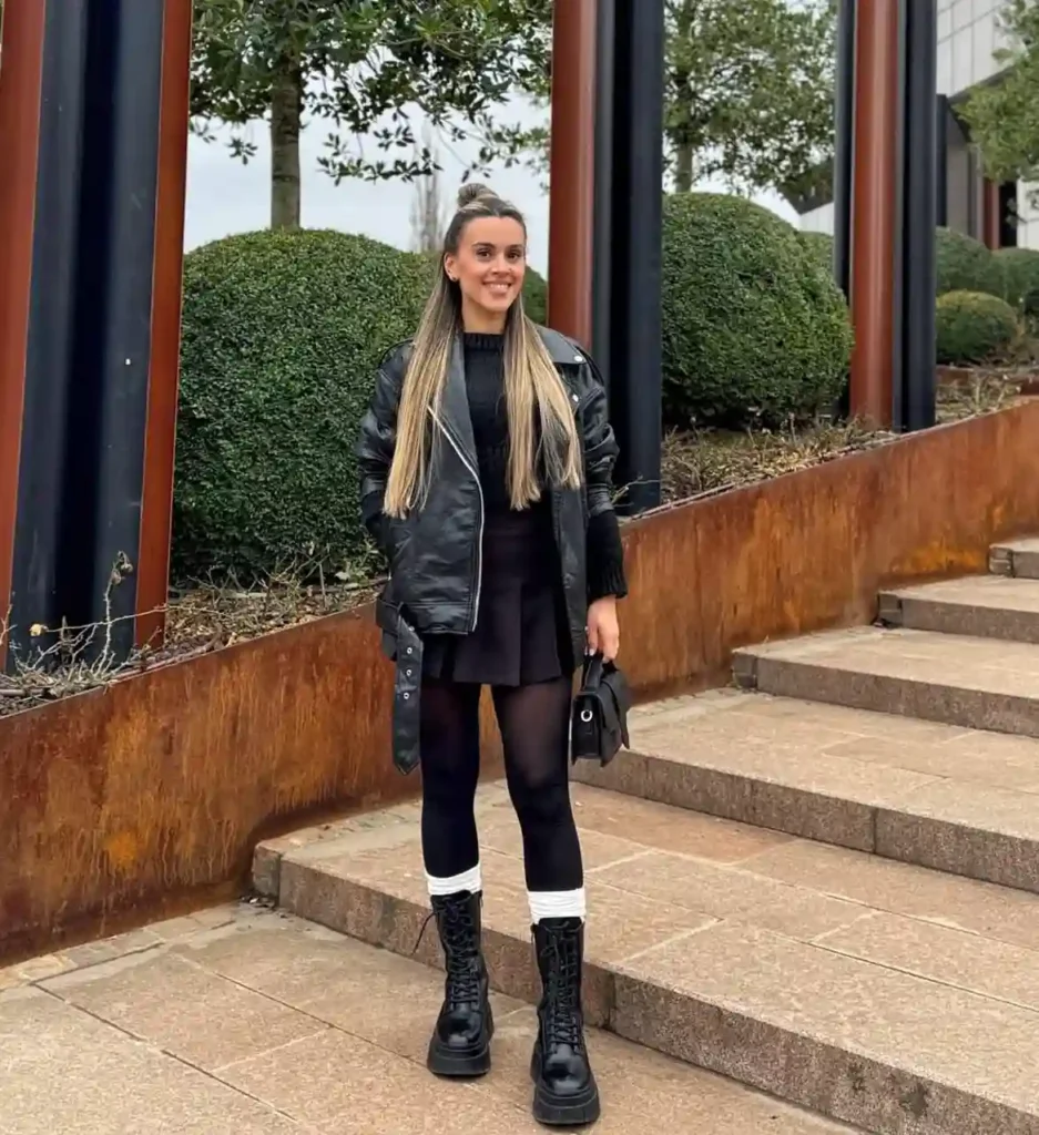 Leather Jacket and Pleated Skirt with Combat Black Boots