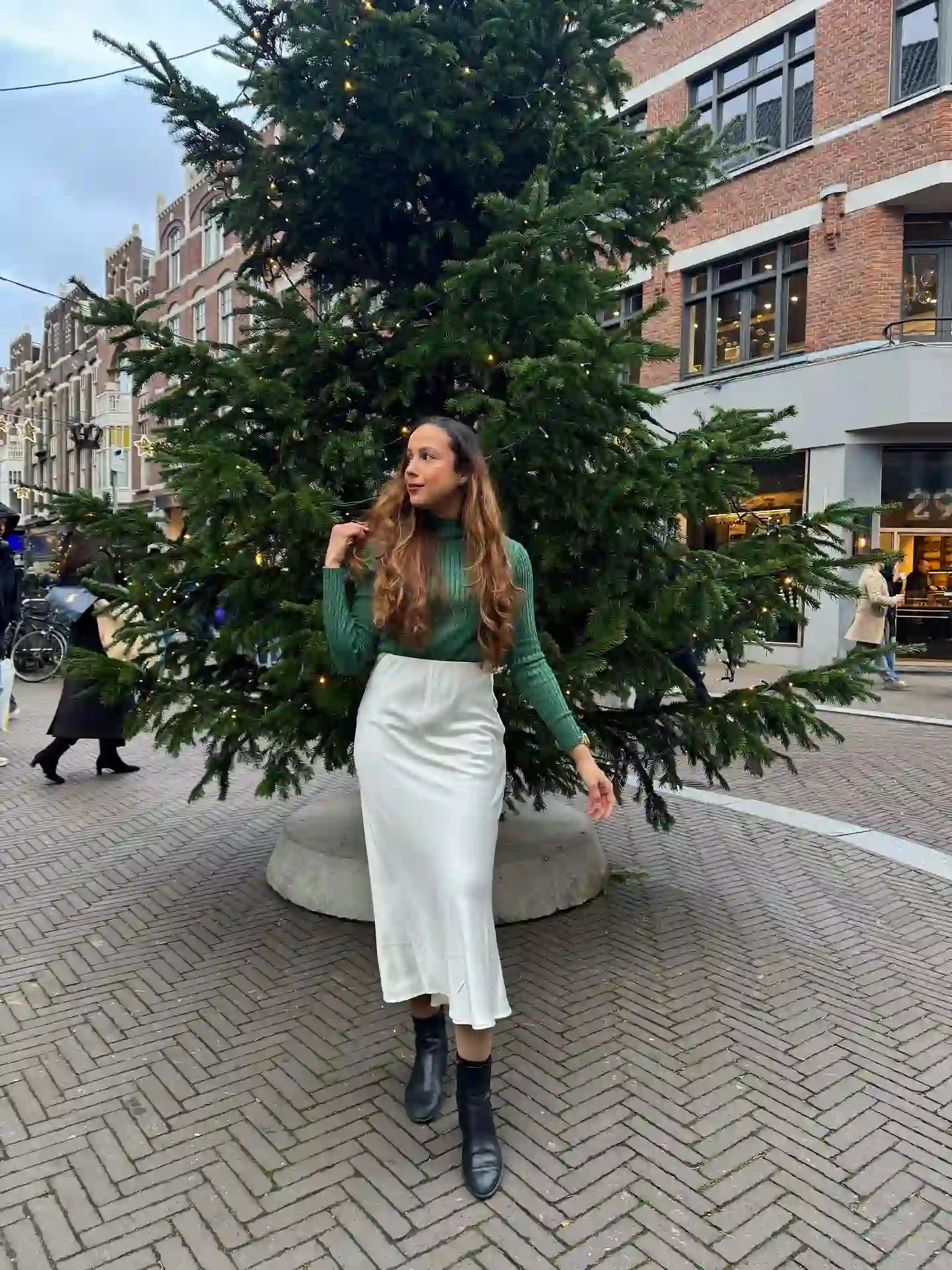 Green Turtleneck with Satin Midi Skirt and Ankle Boots
